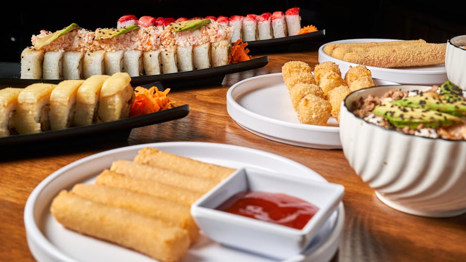 Delicious assortment of sushi and Asian dishes elegantly presented on a wooden table