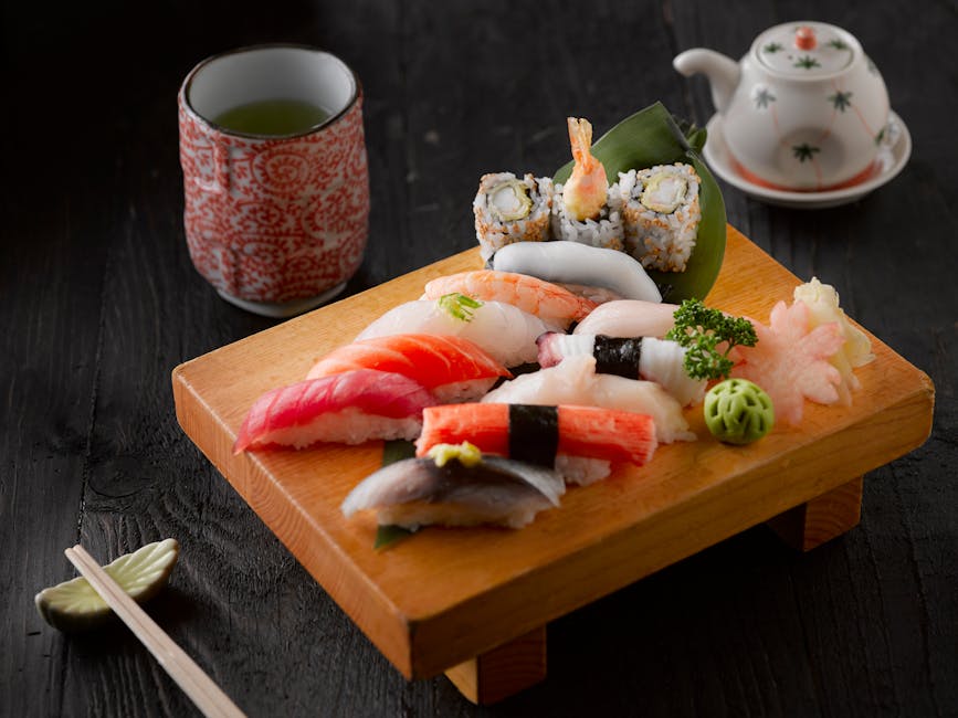 Elegant display of sushi with green tea